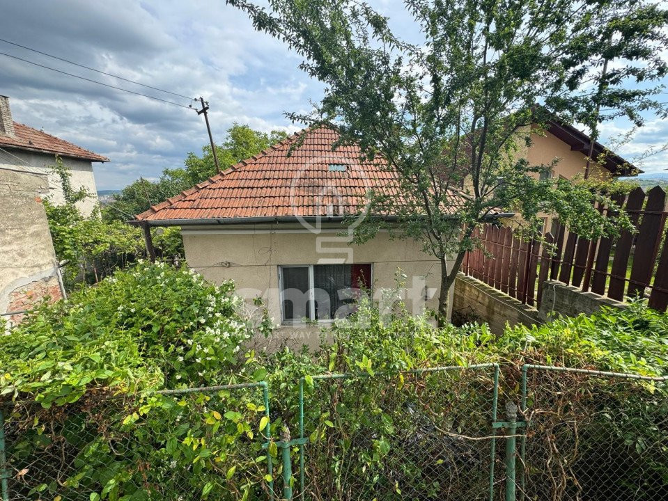 Casa si teren 975 mp Dambul Rotund