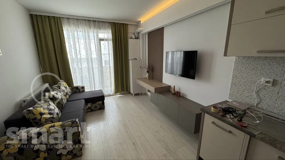 Apartament 2 camere de inchiriat balcon  parcare subterană  zona centrala