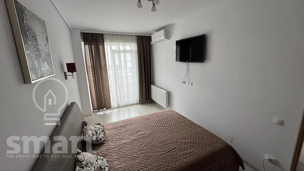 Apartament 2 camere de inchiriat balcon  parcare subterană  zona centrala